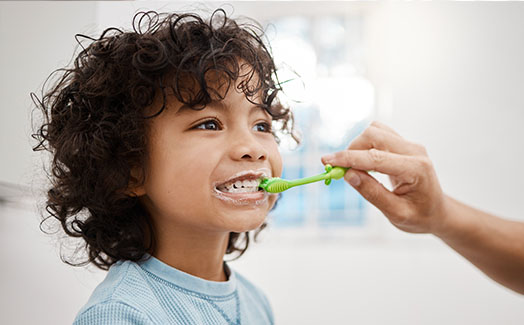 Brushing child's teeth